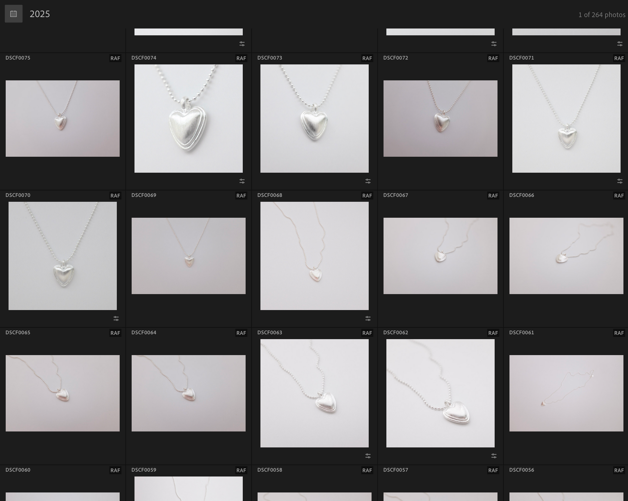 Camera roll of product shots of silver heart necklace